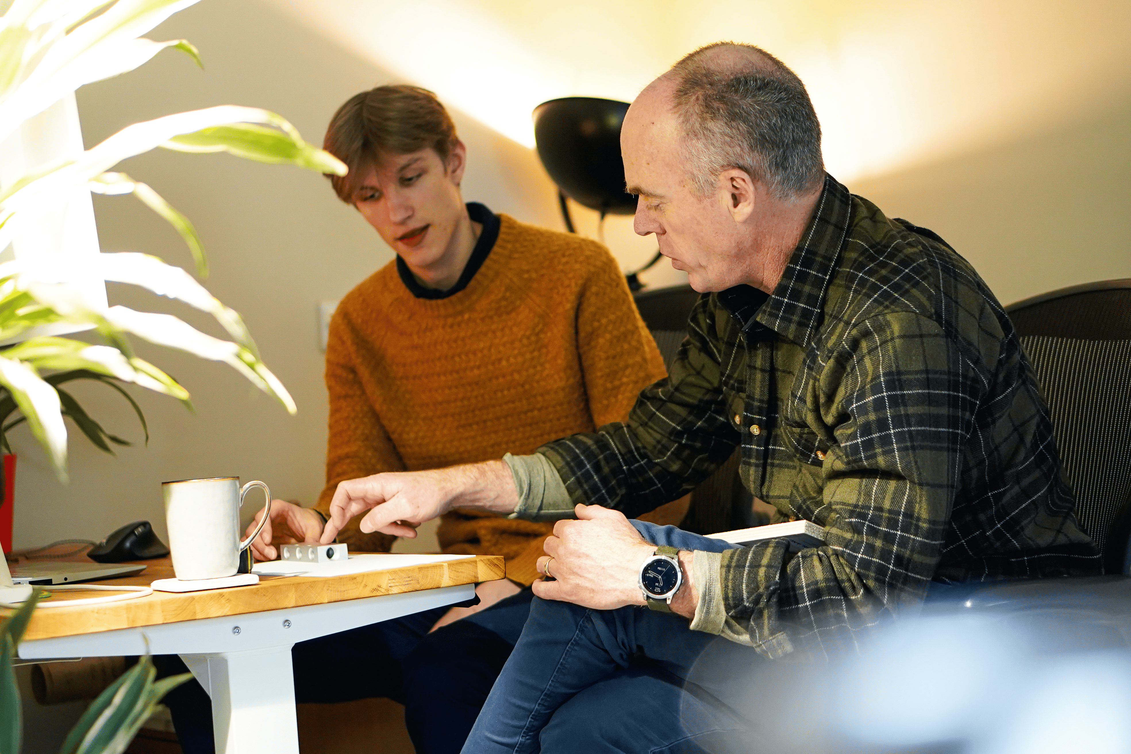 Founder Bruce Hutt (right) collaborating with his team (son-in law Noah).